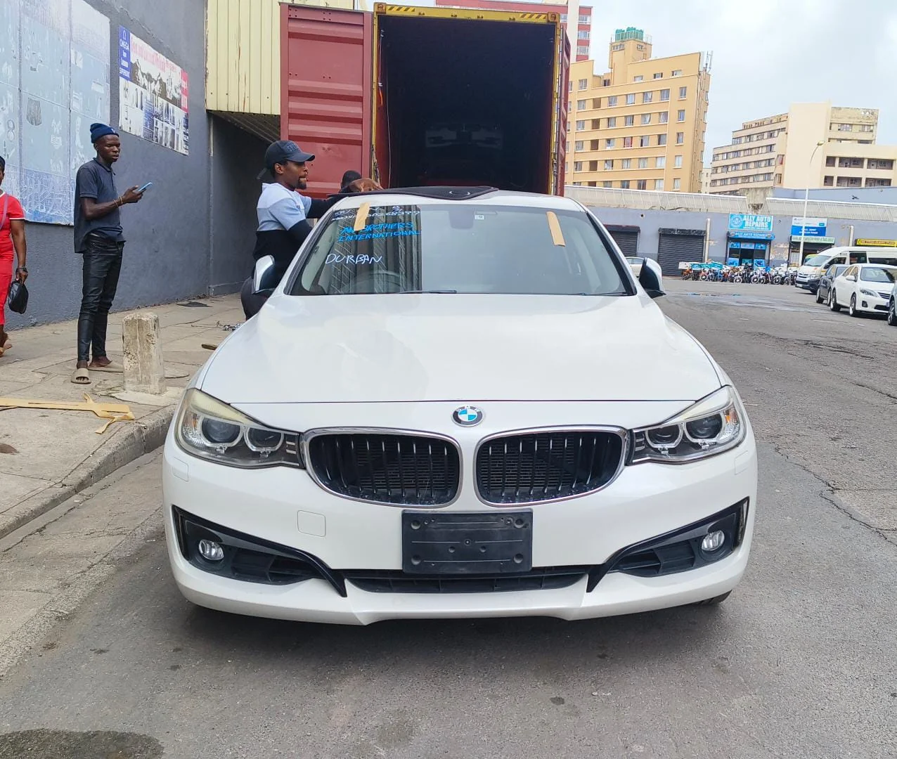 Luxury car dealership showroom displaying premium vehicles