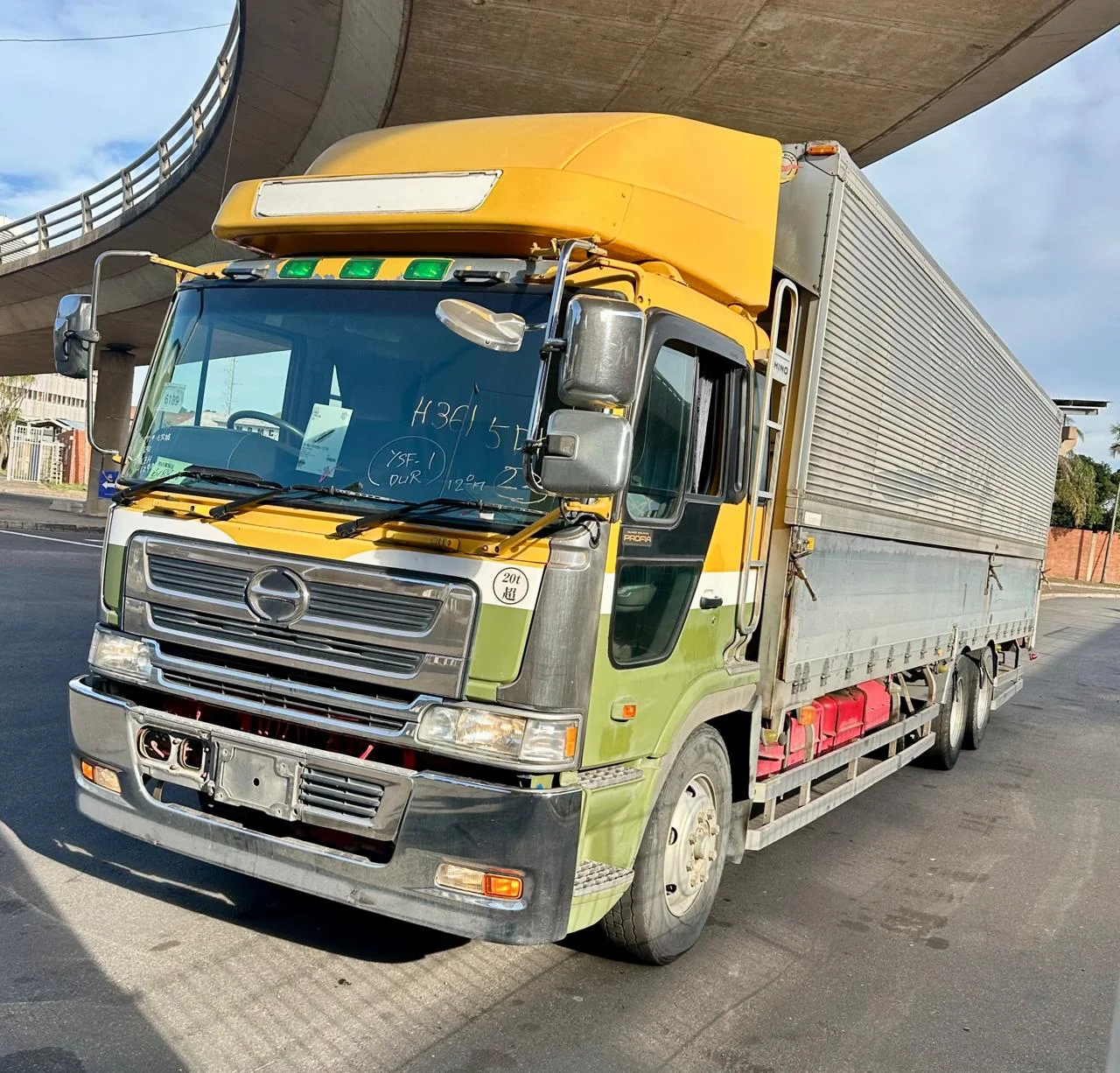 Shipping containers and cargo logistics for international vehicle transport